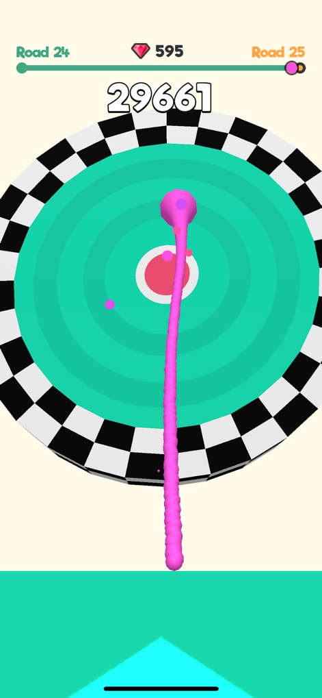 Slime Road - The app showcases the extended pink slime trail as it accurately connects with the bullseye target, signaling the completion of a challenging level.