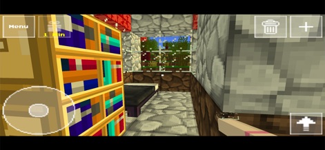 BoomCraft - Esta captura revela la detallada personalización interior disponible para los jugadores, con una estantería llena de bloques de colores y una cama acogedora que invitan a la relajación dentro de sus creaciones.