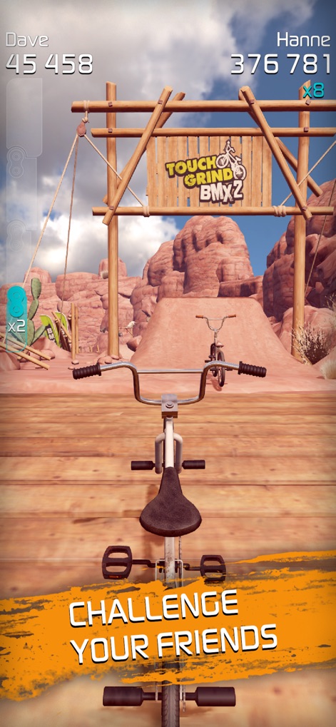 Touchgrind BMX 2 - Challenge other players in intense duels, with competitive scores displayed prominently and dynamic gameplay set against a rugged desert track.