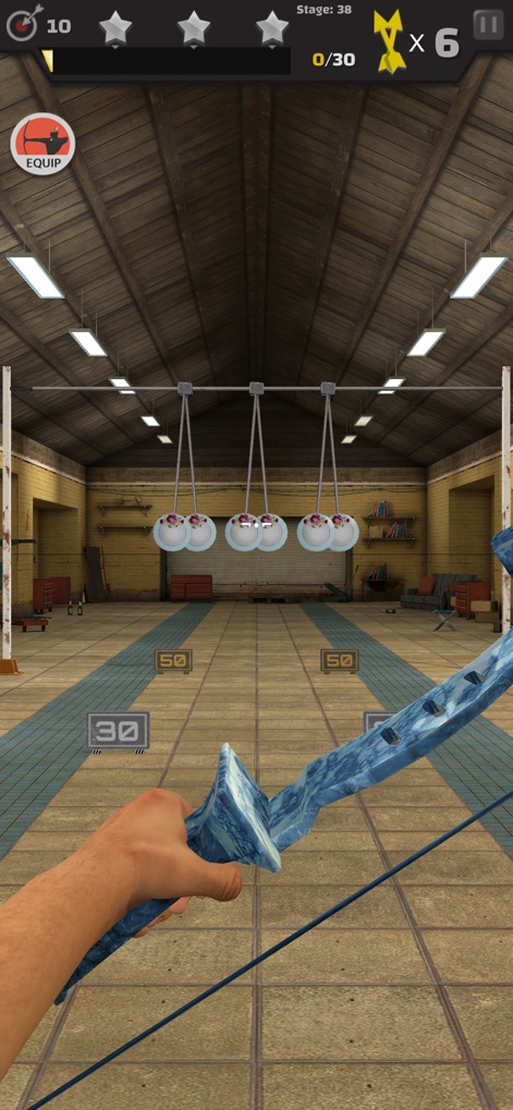 Arrow Master: Archery Game - Explore an advanced indoor range featuring suspended, pendulum-style targets and a clean, well-lit environment.