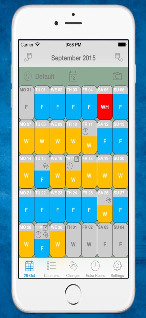Shift Cal - CuadraTurnos PRO - Questa schermata illustra la gestione intuitiva del calendario, dove gli utenti possono visualizzare i turni codificati a colori (ad esempio, 'W' per il lavoro e 'F' per i giorni liberi) e le icone sui giorni indicano note o modifiche apportate.