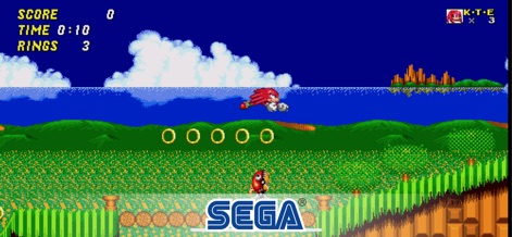 Sonic The Hedgehog 2 Classic - Witness Knuckles in action as he glides through a level, with the score display and ring count visible on the user interface.
