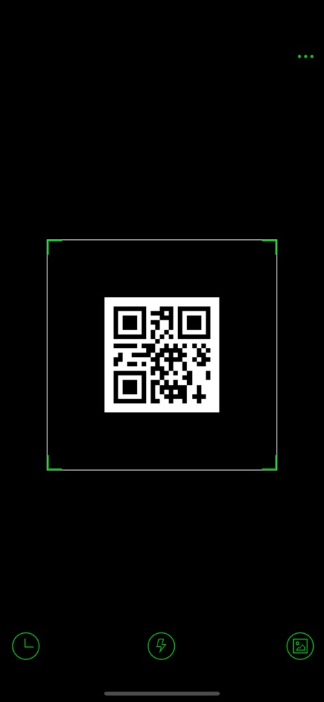 QR Code - QR Reader & Scanner - Observe the app's streamlined scanning interface, featuring a prominent QR code detection frame and an easily accessible flashlight icon for low-light conditions.