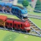 In Train Conductor World: European Railway, the trains move in on different tracks and you just tap and drag to direct them to the correct ones