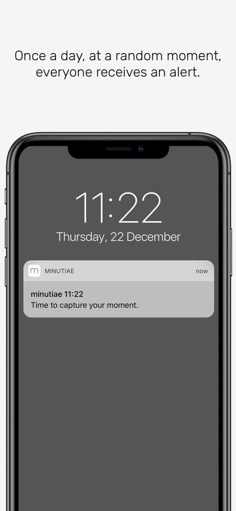 minutiae: Real Life - A unique daily alert prompts users to engage, as illustrated by the phone screen displaying a notification for 'minutiae 11:22' at a random moment.