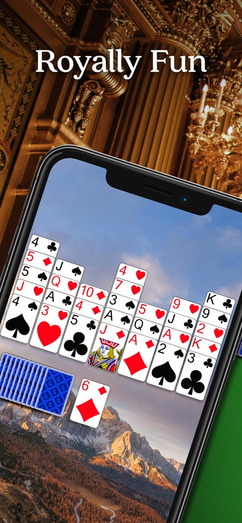 Crown Solitaire: Card Game - Experience the immersive background scenery featuring mountains and skies, enhancing the game board's visual appeal.