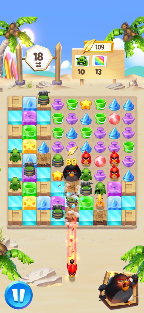 Angry Birds Hatchlings - Observe the core match-3 gameplay, featuring a colorful grid of items and the impactful presence of an Angry Bird character assisting in clearing the board.