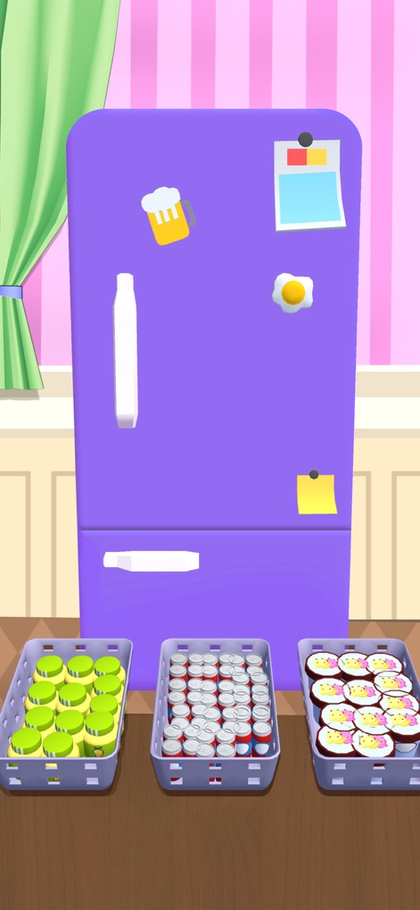 Fill Up Fridge!- Organize Game - See how the app presents a vibrant purple fridge awaiting organization, alongside three baskets brimming with diverse groceries and snacks.