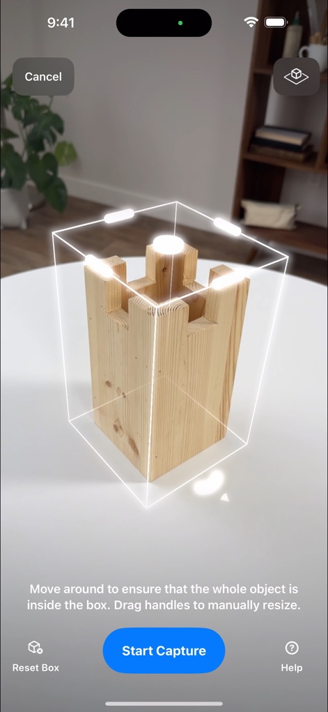 Reality Composer - See how the app guides users through photogrammetry setup with a precise bounding box and a prominent 'Start Capture' button for object acquisition.