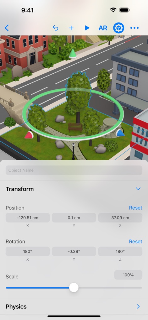 Reality Composer - Users can precisely manipulate objects within the scene, demonstrated by the selected tree with its green highlight and the comprehensive transform properties panel.