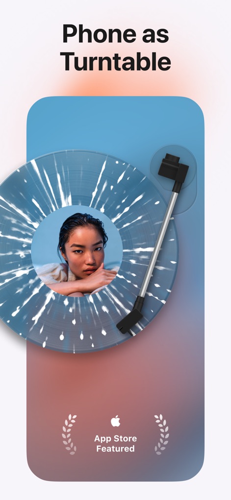 MD Vinyl for Music App - Esta herramienta convierte el dispositivo móvil en un tocadiscos interactivo, donde se observa un vinilo con diseño de salpicaduras azules y una aguja en posición de reproducción.