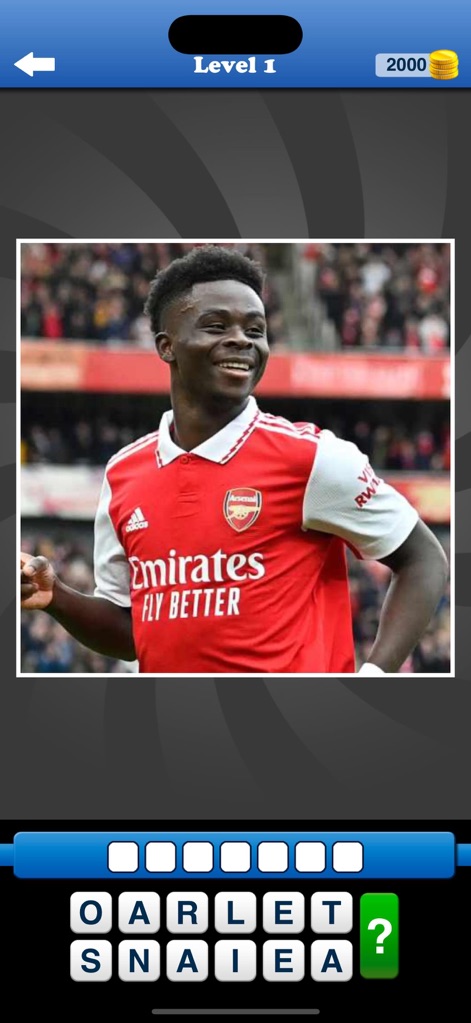 Whats the Team? Football Quiz - The app showcases prominent players in their club's colors, motivating users with a visible coin counter for in-game rewards.