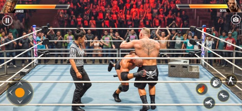 Real Wrestling Championship - Aquí se aprecia la variedad de técnicas de combate, con un luchador aplicando una llave en el suelo, mientras la presencia de un árbitro añade autenticidad a la simulación del encuentro.
