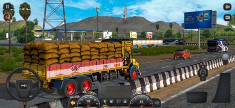 Truck Masters: India Simulator - Users can navigate a cargo-laden truck across expansive highways, where a distant billboard adds a touch of realism to the scenic route.