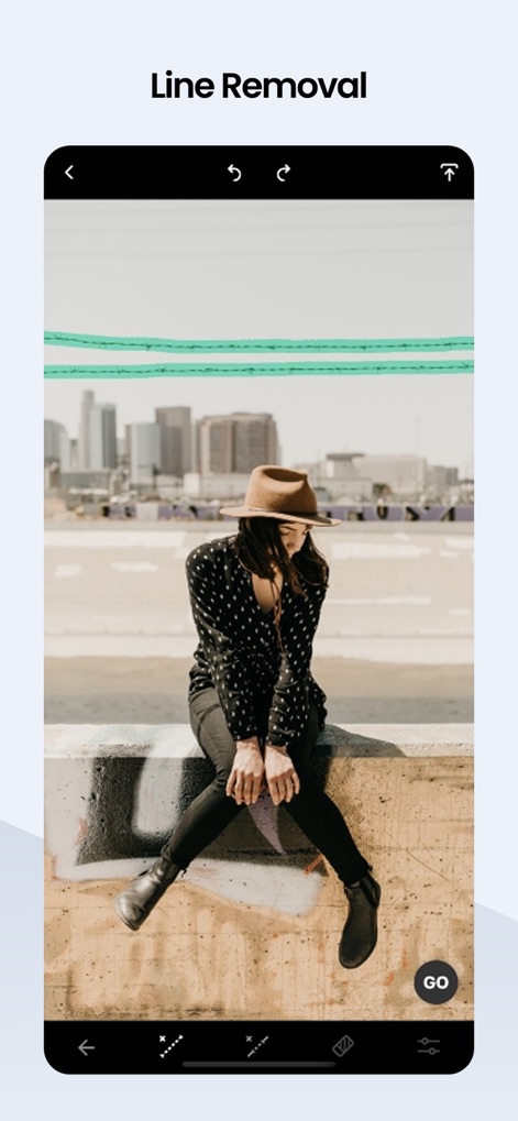 TouchRetouch - This feature allows for the effortless removal of distracting linear objects like wires and power lines, often initiated with a simple "GO" button tap.