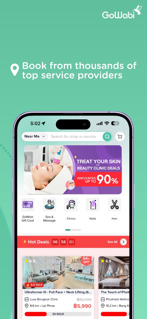 GoWabi - Beauty & Wellness - Users can browse an extensive array of services in the "Hot Deals" section, facilitating bookings from thousands of providers, easily filtered by the "Near Me" function.