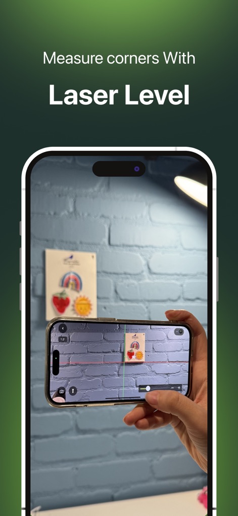 Bubble Level for iPhone - Los usuarios pueden emplear la función de nivel láser de realidad aumentada para proyectar líneas precisas, como se observa en la proyección de la línea horizontal sobre la pared de ladrillo.