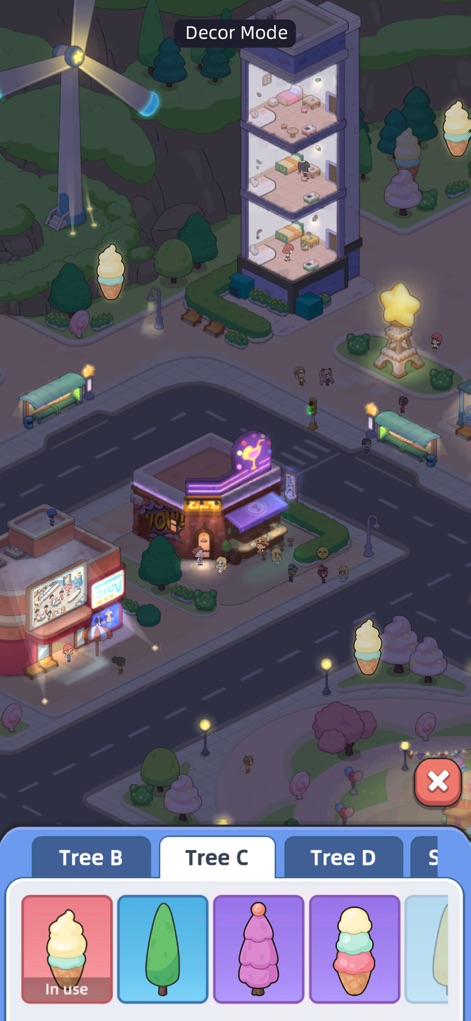 Happy Citizens - Mayor Sim - The app presents the city's captivating evening ambiance with glowing structures and an active construction area, while offering extensive customization through the "Decor Mode" menu for landscaping with diverse tree options.