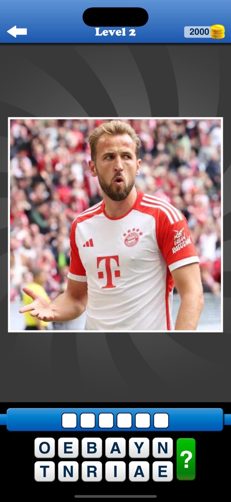 Whats the Team? Football Quiz - The app challenges users to identify teams from a player's kit, providing a selection of scattered letter tiles to form the answer.