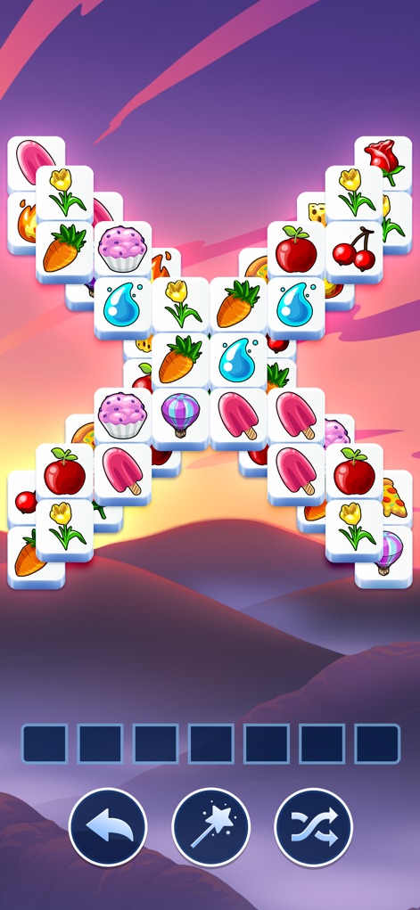 Tile Club - Matching Game - See how the app presents an intricate butterfly-shaped tile layout filled with colorful fruit tiles, creating an engaging puzzle.