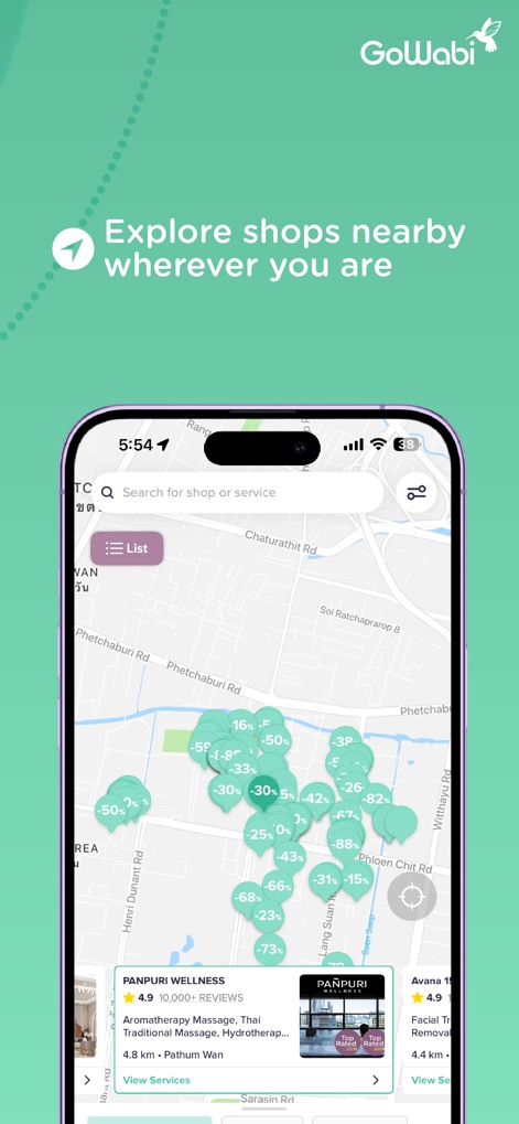 GoWabi - Beauty & Wellness - The app leverages an interactive map to help users visualize nearby service providers with overlaid discount percentages, while bottom cards offer quick access to specific listings like "PANPURI WELLNESS".