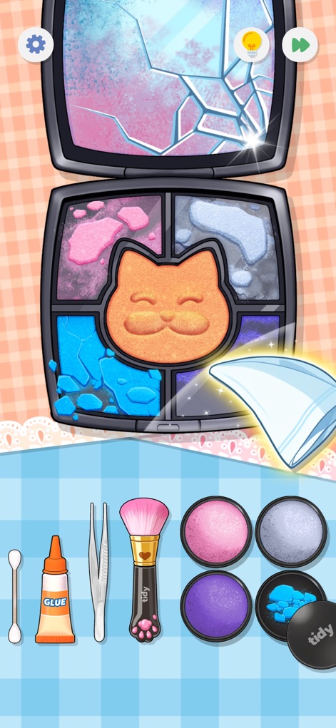 SatisPuzzle: Perfect Tidy - Users can mend a cracked mirror and restore colorful eyeshadows using precision tools like glue and a tiny brush.