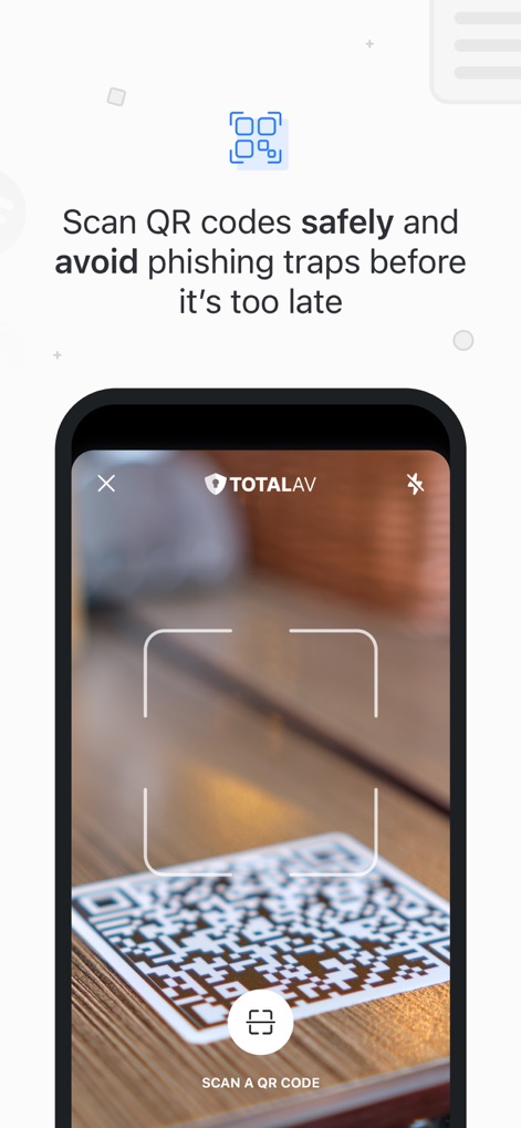 TotalAV - This visual presents the app's QR Code Check feature with its active camera viewfinder for scanning and the prominent "SCAN A QR CODE" button.
