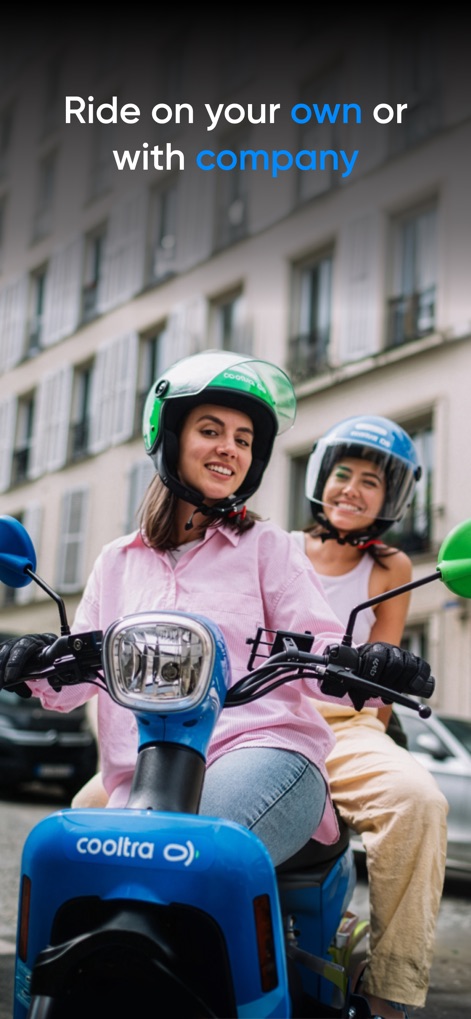 Cooltra: E-moped rentals - Users can enjoy rides solo or with a companion, as evidenced by the two individuals on an e-moped and the convenient provision of two helmets.