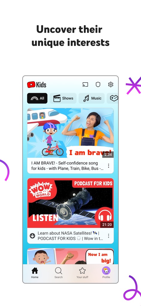 YouTube Kids - La interfaz principal presenta una navegación intuitiva y visualmente atractiva para los niños, donde la barra de categorías superior facilita el acceso a "Shows" y "Music", mientras que los miniaturas de video grandes y coloridas invitan a explorar contenido como "I AM BRAVE!" o "PODCAST FOR KIDS".