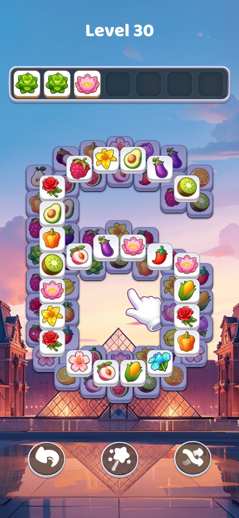 Tile Explorer: Tiles Clear! - The app offers interactive guidance with a pointing hand to assist players in forming complex tile formations, like this challenging '6' shape.