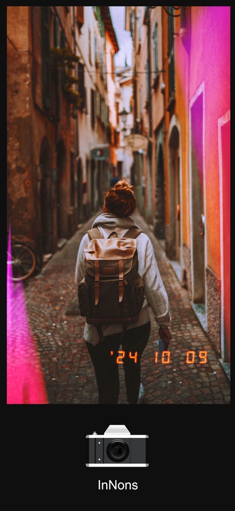Kamon - Vintage Film Camera - Utilize vibrant, colorful light leak streaks and an automatic date stamp to add expressive, retro character to any scene.