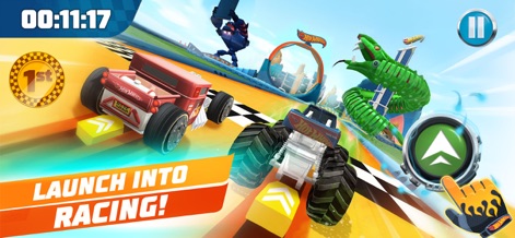 Hot Wheels Unlimited - Esta captura muestra dos vehículos de Hot Wheels en una pista de cuadros, con un Némesis serpiente verde a un lado y un claro botón de impulso en pantalla para la velocidad.
