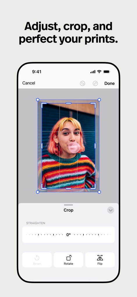 Polaroid Hi·Print - Explore the intuitive cropping interface, enabling users to fine-tune image composition and utilize tools like straightening and rotation for perfect framing.