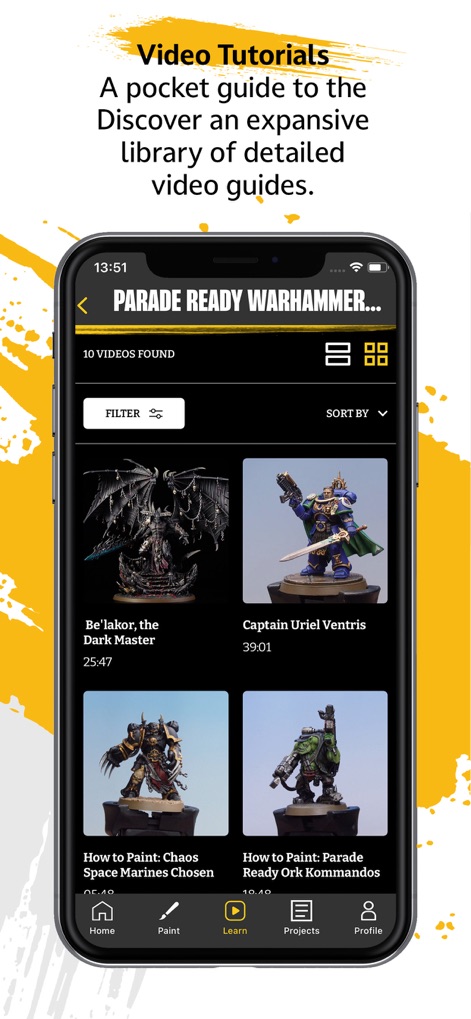 Warhammer Colour: The App - O aplicativo oferece uma extensa biblioteca de tutoriais em vídeo, apresentando guias detalhados como 'Be'lakor, the Dark Master' e visões gerais de técnicas, incluindo 'How to Paint: Parade Ready Ork Kommandos'.