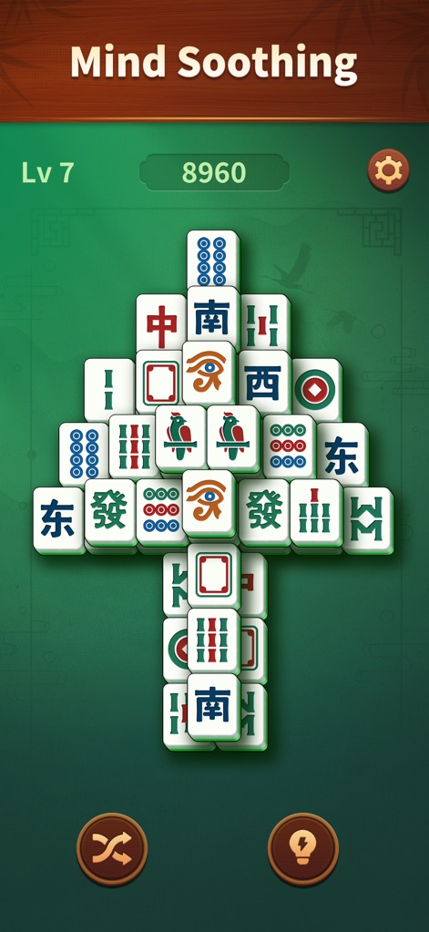 Jade Mahjong - Experience the "Mind Soothing" quality of the app through its gentle green background and the aesthetically pleasing, traditional mahjong tile designs.