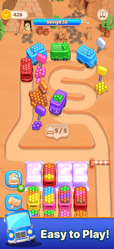 Color Bus Trip - The app demonstrates its intuitive one-tap gameplay within a captivating desert ruins setting, showcasing a completed bus load with the "5/5" indicator.