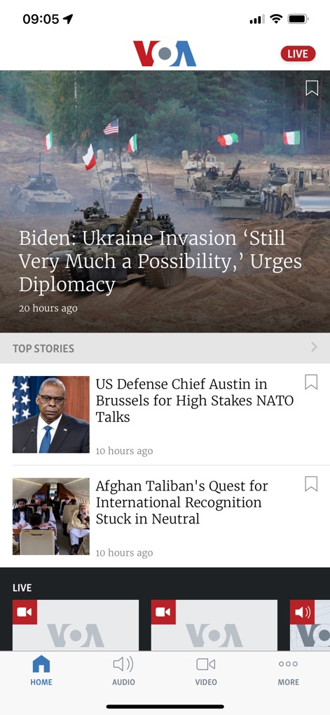 VOA - The app presents current events with a featured headline image and provides quick navigation to 'TOP STORIES' and multimedia content through the intuitive bottom bar.