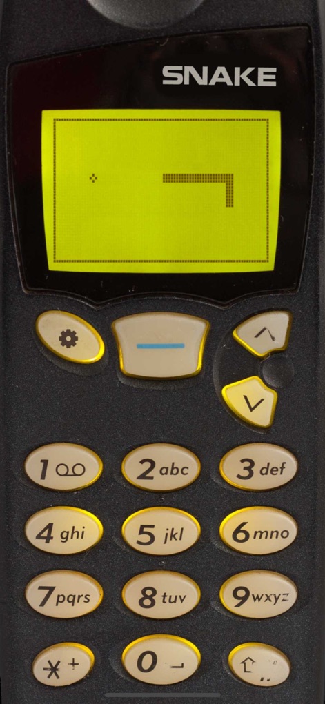 Snake '97: retro phone classic - The app faithfully recreates the original experience, showcasing the classic physical keypad and an authentic dot-matrix display.