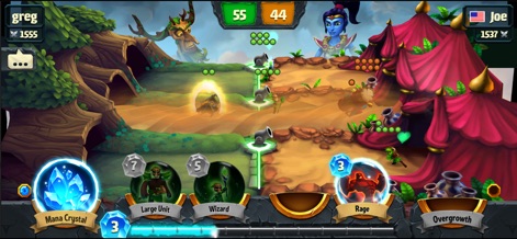 Spellbinders - Questo strumento illustra un'altra arena di gioco caratterizzata da un ambiente boschivo e mostra una mano di carte con opzioni strategiche come "Large Unit" e l'incantesimo "Overgrowth" per influenzare la partita.