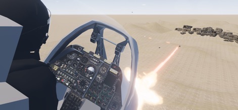C-RAM CIWS simulator - Desde la cabina de un helicóptero, los jugadores experimentan el vuelo sobre un árido paisaje desértico, mientras un potente rayo de energía se dispara desde el lateral de la aeronave.