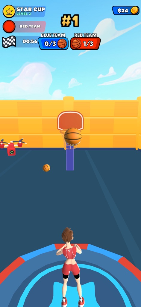 All Stars Challenge - Ce moment met en évidence la réussite d'un défi d'adresse, où la balle est en plein vol vers le panier, et le score de l'équipe rouge progresse, soulignant l'importance de la maîtrise des objectifs spécifiques.