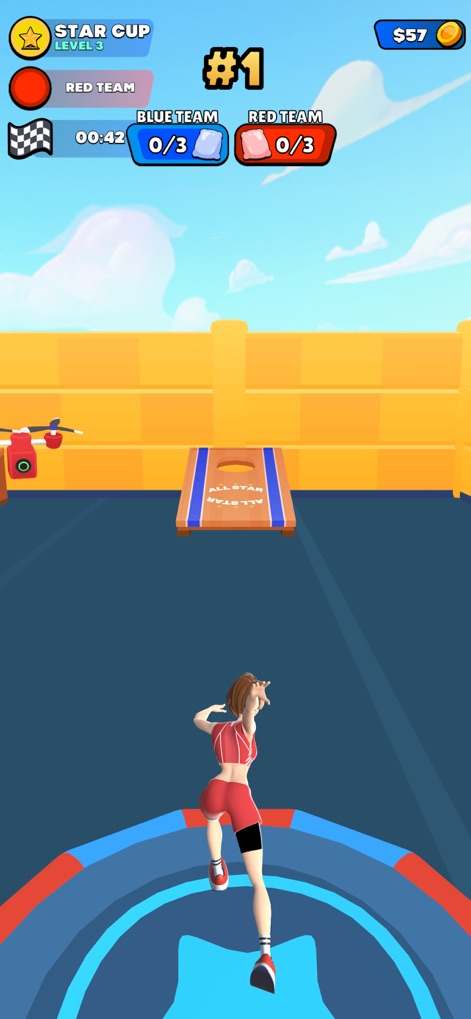 All Stars Challenge - L'application intègre des mini-jeux variés comme cette épreuve de lancer de ballon, exigeant précision et réflexes, avec un suivi clair des scores des équipes et la présence d'éléments interactifs comme le drone.