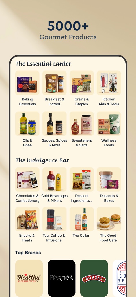 Nature's Basket - L'app presenta oltre "5000+ Gourmet Products" in evidenza, offrendo una navigazione intuitiva attraverso categorie dettagliate come "The Essential Larder" e "The Indulgence Bar" per esplorare un'ampia gamma di prodotti.