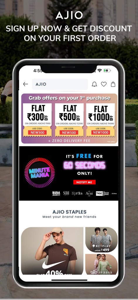 AJIO Online Shopping App - The app highlights attractive first-purchase discount banners, offering immediate savings, alongside a thrilling 'MINUTE MANIA' timed offer for quick deals.