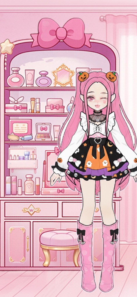 Sparkle Style: Fashion Design - Witness the app's capacity for themed fashion styling, highlighting a character adorned in a unique Halloween-themed outfit and a charming vanity dresser filled with cosmetic items.