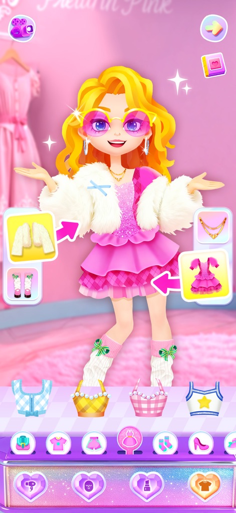 Aha Makeover-Beauty Salon Game - Die App ermöglicht Nutzern, ihre Avatare mit trendigen Kleidern wie dem pinken Kleid und der flauschigen Jacke auszustatten und aus einer Vielzahl von Modeaccessoire-Icons zu wählen, um einzigartige Outfits zu kreieren.