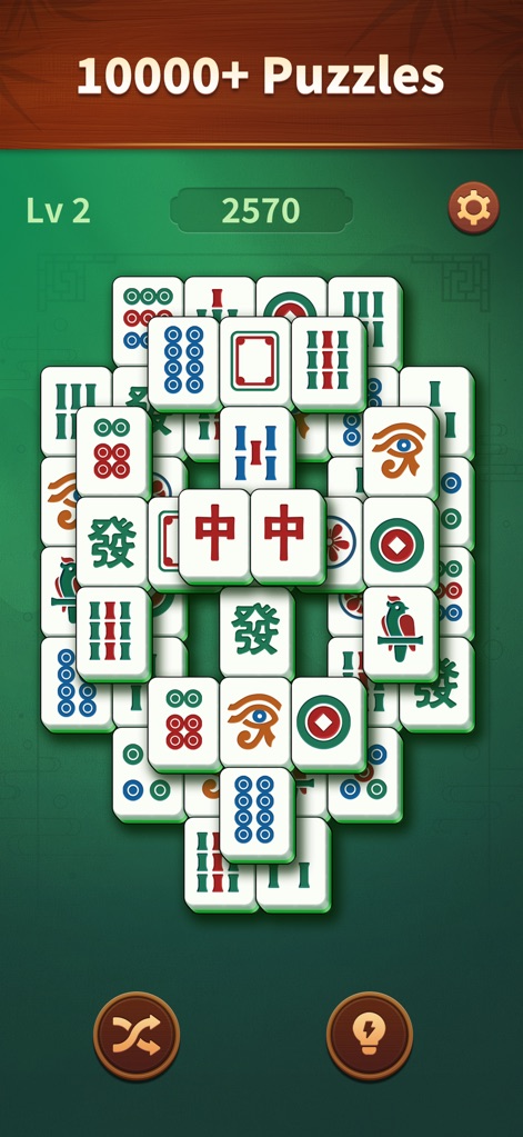 Jade Mahjong - The "10000+ Puzzles" banner demonstrates the vast content library, featuring a complex tile configuration and clear scoring system.