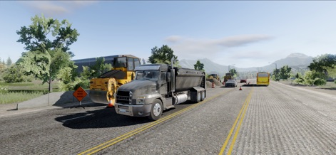 Truck Simulator Big Rigs - Ein Kipplaster ist an einer Baustelle zu sehen, wo eine Dampfwalze und Absperrkonen die Arbeitsumgebung authentisch darstellen.