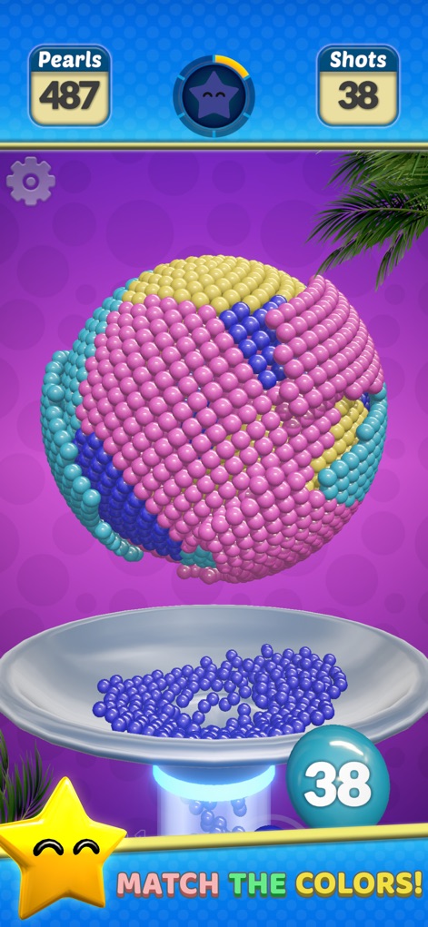 Pearl Gem! - Esta captura resalta la vibrante combinación de colores que forman la esfera y el claro objetivo de combinar perlas, esencial para avanzar en el juego.