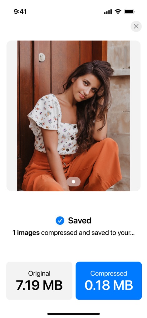 Compress Photos, Resize Image - Upon completion, the app presents a clear 'Saved' confirmation and distinct buttons showcasing the 'Original' and significantly 'Compressed' file sizes for user verification.